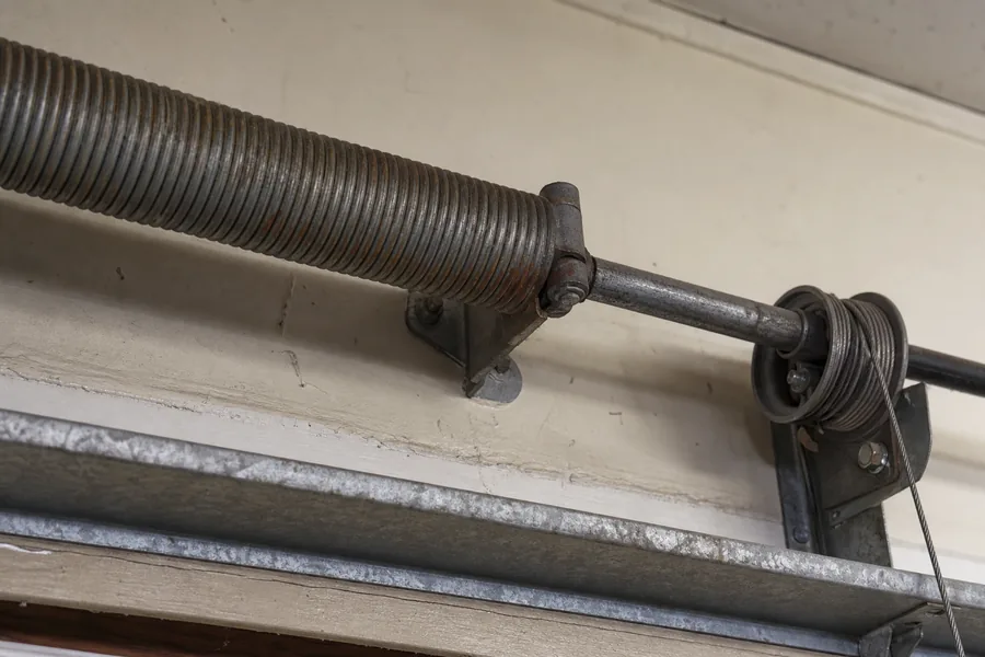 Torsion spring, shaft and cable drum above a garage door in Bellevue, WA